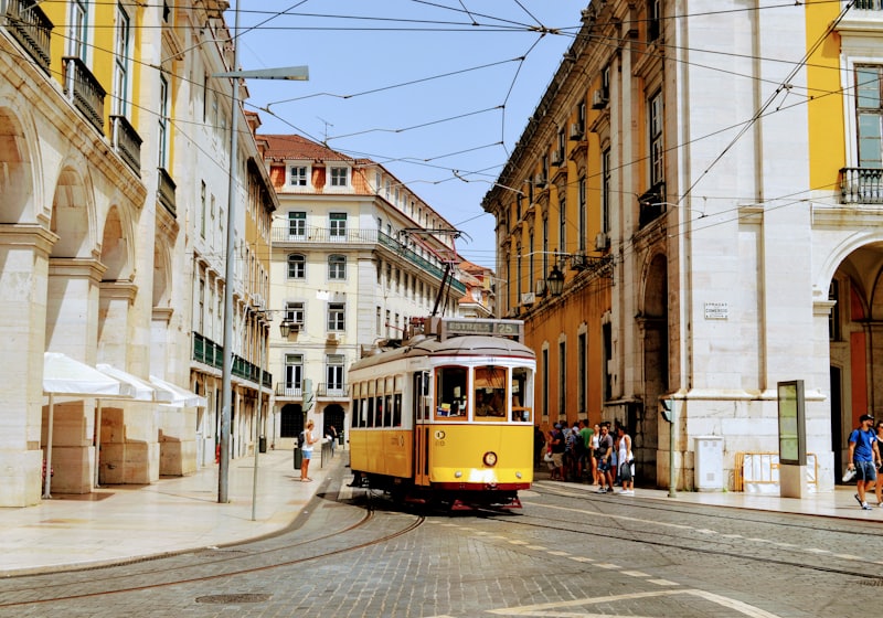 Lisbon — yellow tram in the Baixa district